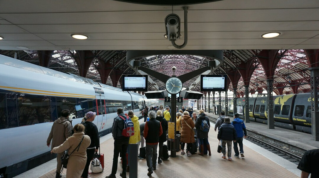 Commuters queuing on a Copenhagen metro platform